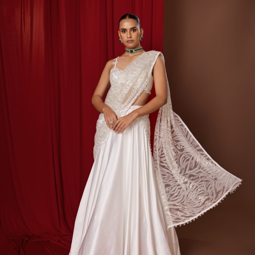sari dress Gold Draped Gown I Dash & Dot S Alak dark blue Georgette Designer Party Wear Sari saree What is a Sari Saree is a rectangular piece of unstitched fabric which is draped in a very fascinating manner Sari Palace